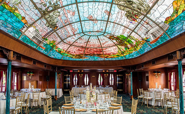 Sternwheeler interior highlighting stain glass ceiling on Mission Bay