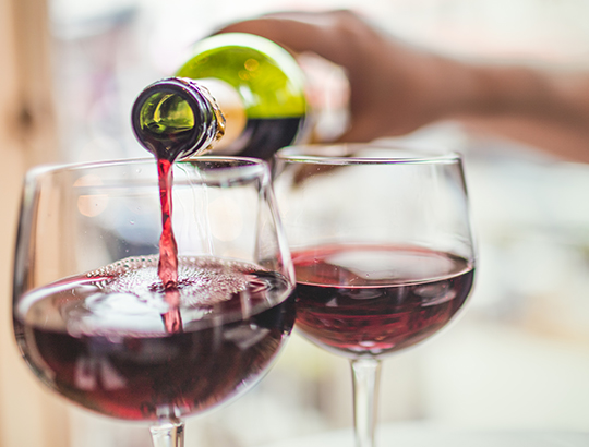 Wine pouring into wine glass