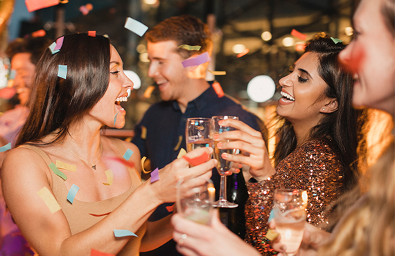 Young adults enjoying NYE celebrations on Mission Bay