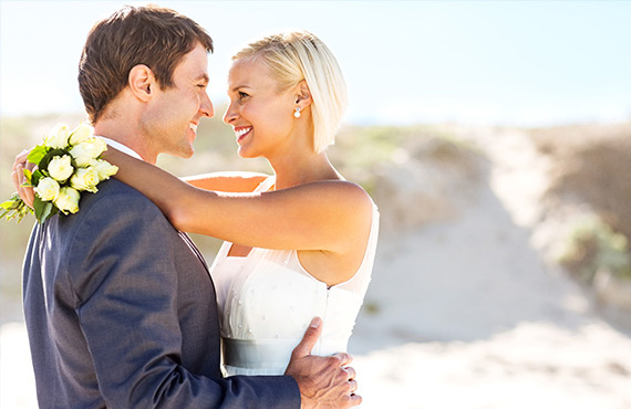 Couple embracing on their wedding day