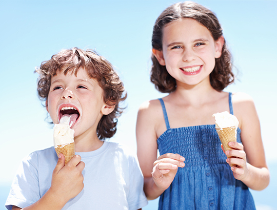 Two kids enjoying ice cream on Mission Bay