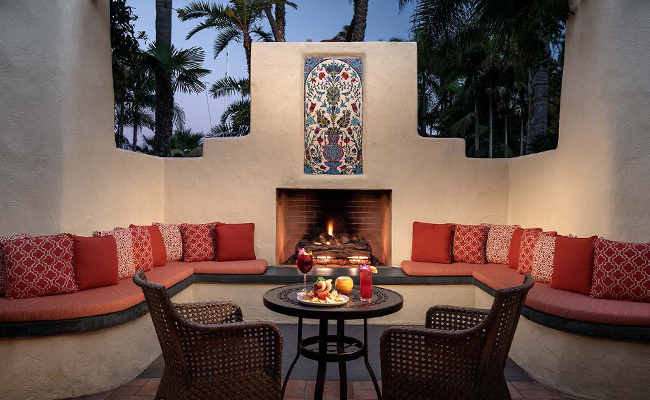 Newly renovated outdoor fireplace and seating area