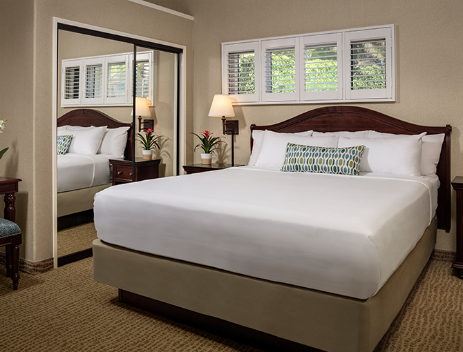 Deluxe Suite with one queen bed at the Bahia Resort Hotel in Mission Beach, San Diego