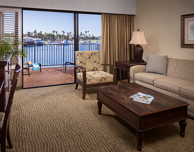 Bayfront View Suite living room area overlooking Mission Bay at the Bahia Resort Hotel in Mission Beach, San Diego