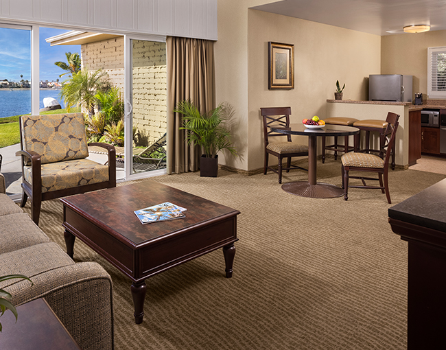 Deluxe Bayfront Suite living room area overlooking Mission bay at the Bahia Resort Hotel in Mission Beach, San Diego