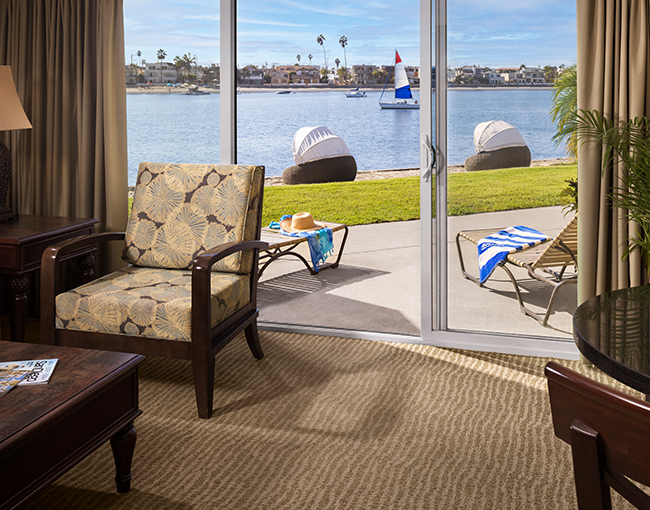 Deluxe Bayfront Suite patio with view of Mission Bay at the Bahia Resort Hotel in Mission Beach, San Diego
