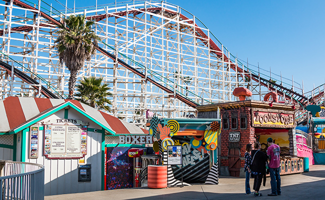 The roller coaster and shops at Belmont Park, the perfect spot for day 3 of the 3-day fall itinerary in San Diego.