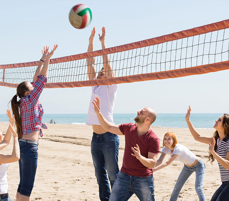 Team building beach volleyball tournament at the Bahia Resort Hotel in San Diego.