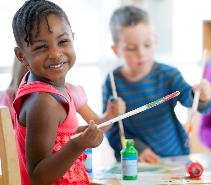 A group of children painting during the Kid's Craft Corner at the Bahia Resort Hotel in Mission Bay, San Diego.