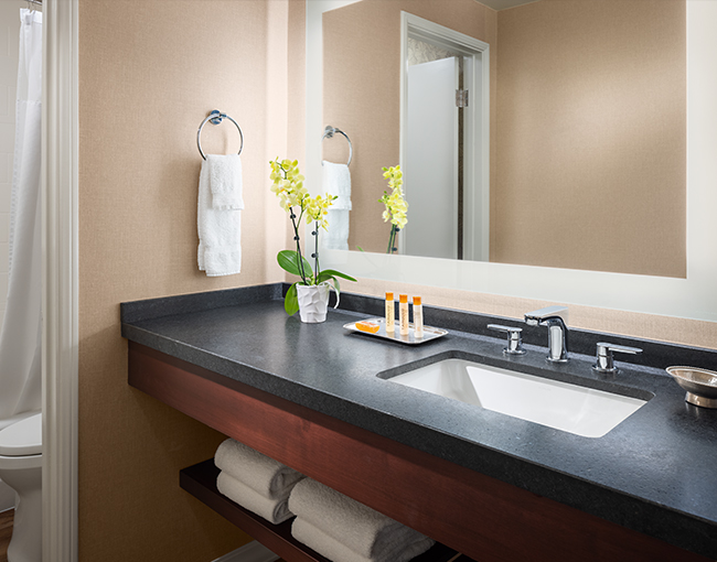 Double sinks with towel rack