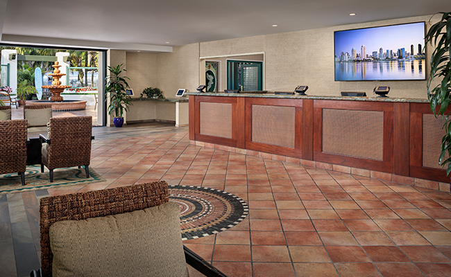 The lobby at the Bahia Resort Hotel in Mission Bay, San Diego that seamlessly blends indoor and outdoor spaces with the addition of fully retractable floor-to-ceiling glass doors.