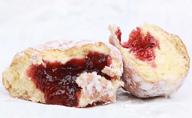 Jelly donut cut in half