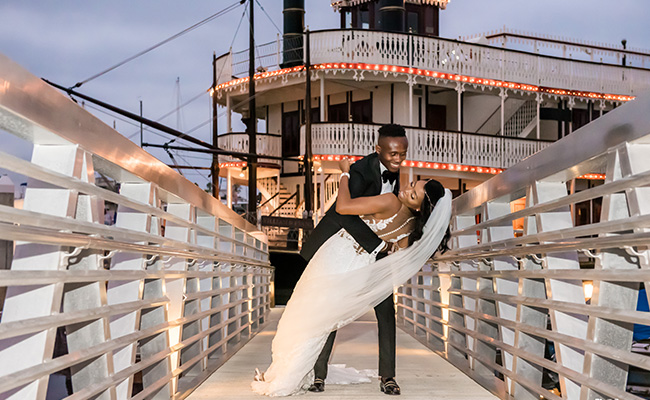 Wedding couple walking to sternwheeler on Mission Bay