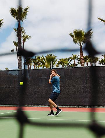 Playing tennis at Bahia Resort Hotel in San Diego